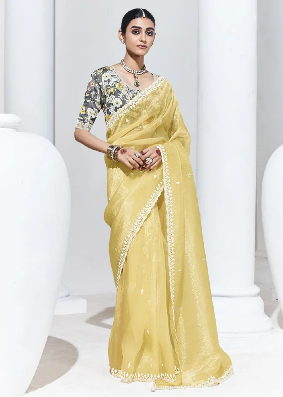 Stunning Yellow Organza Embroidered Party Wear Saree